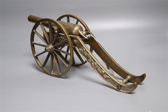 A bronze model canon, length 32cm